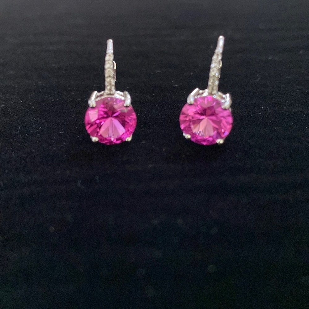 Dark pink stone earrings set in 925 silver.